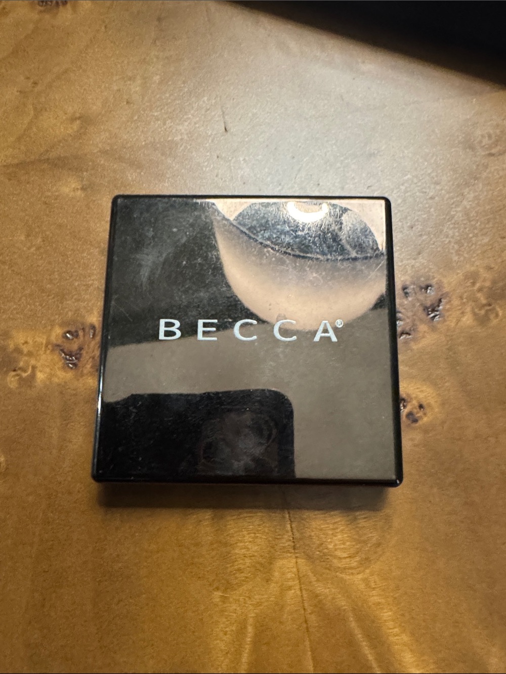 BECCA Compact Highlighter/Pressed Powder - Black